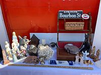 Wide shot of all items arranged against red backdrop