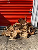 group shot of all baskets against red storage door