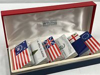 Closed presentation box opened to show six sealed decks in slots