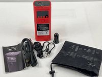 Full contents: compressor, hose, cables, adapter, pouch, manual