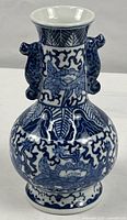 full view of blue and white porcelain vase front
