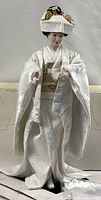 Full view of Midori porcelain doll in wedding kimono