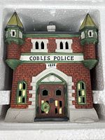 Front view of Cobles Police Station showing facade details