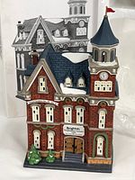 Front and side view of Dept. 56 Brighton School porcelain building