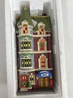 Front of porcelain townhouse inside styrofoam