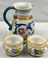 Pitcher with two matching bowls front view