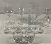 All ten pieces of crystal and glass barware displayed together