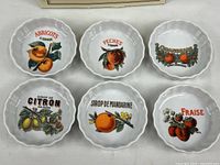 All six fruit-design ramekins displayed