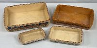 All four rectangular pottery dishes front view