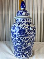 Front view of blue-and-white porcelain ginger jar with lid