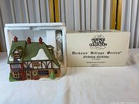 Cottage beside original box and styrofoam insert