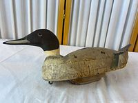 Left side view of full wooden pintail decoy