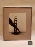 Front view showing photograph, mat and frame