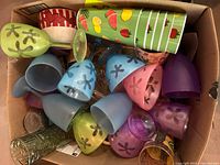 Box of assorted plastic cups and goblets