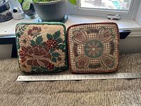 Both pillows side by side with ruler for scale