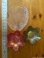 Leaf platter and two flower bowls beside ruler