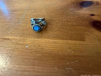 Front view of ring showing labradorite and two moonstones