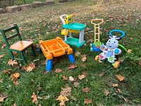 Group shot of all five toddler items on grass