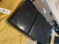 Three closed SKS jewelry organizers on table