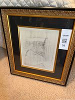 Front view of framed Toulouse-Lautrec print showing artwork, matting and frame
