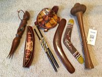 Group shot showing all nine wooden cultural items