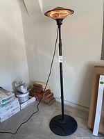 Full view of freestanding Cascade electric patio heater