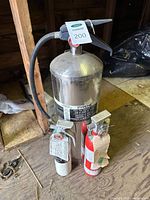 All three fire extinguishers grouped together