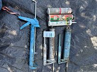 Overview of caulking gun, cartridges, grease guns