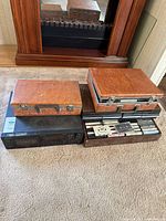 Overall lot showing Pioneer deck, wood cassette cases and tapes