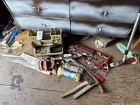 Overall view of assorted tools on floor