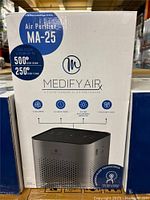 Retail box of Medify MA-25 air purifier showing product details