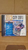 Front of SimCity 2000 CD Collection jewel case showing cover art and title