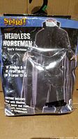 Front of packaged Spirit Headless Horseman costume showing branding and size chart