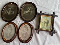 Group shot of all five frames showing design, finish, and missing leaf on religious frame