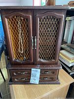 Front view of jewelry cabinet, doors closed