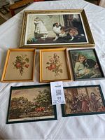 All six framed prints laid out on table