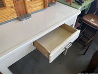 Open drawer view displaying interior and hardware