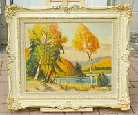 Full view of framed painting on easel