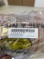 barcode label on sealed pack showing product details and origin