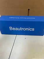 Closed blue Beautronics box