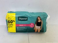 Front of sealed Depend Fresh Protection 30 count pack