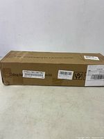 Sealed shipping box showing labels and product identification