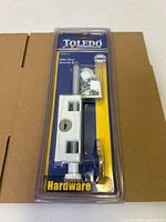 Front view of sealed package showing entire security bolt and hardware