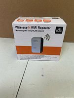 Front of retail box showing Wireless-N WiFi Repeater image and 300M marking