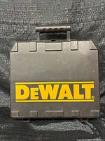 Front of black DEWALT carrying case closed