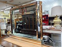 Front view of entire mirror showing design and dimensions context