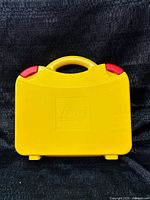 Closed yellow LEGO carry case front view