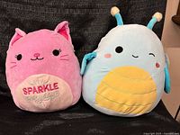 Both Squishmallows side by side for size comparison