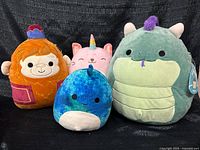 Group image of all four Squishmallows plush toys
