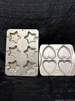 Two Wilton aluminum cavity pans, star and heart shapes